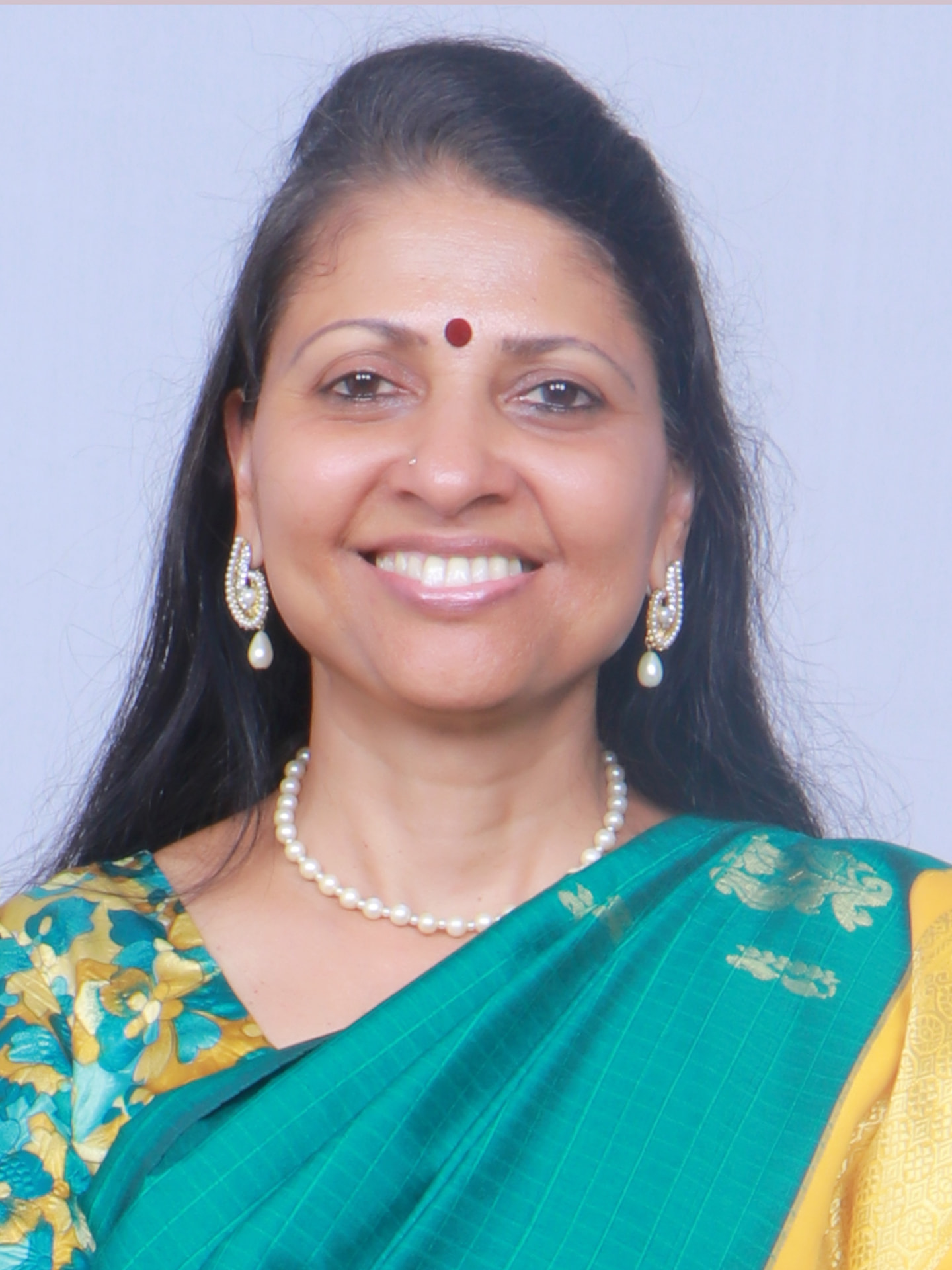 Shanthi Yogini smiling warmly